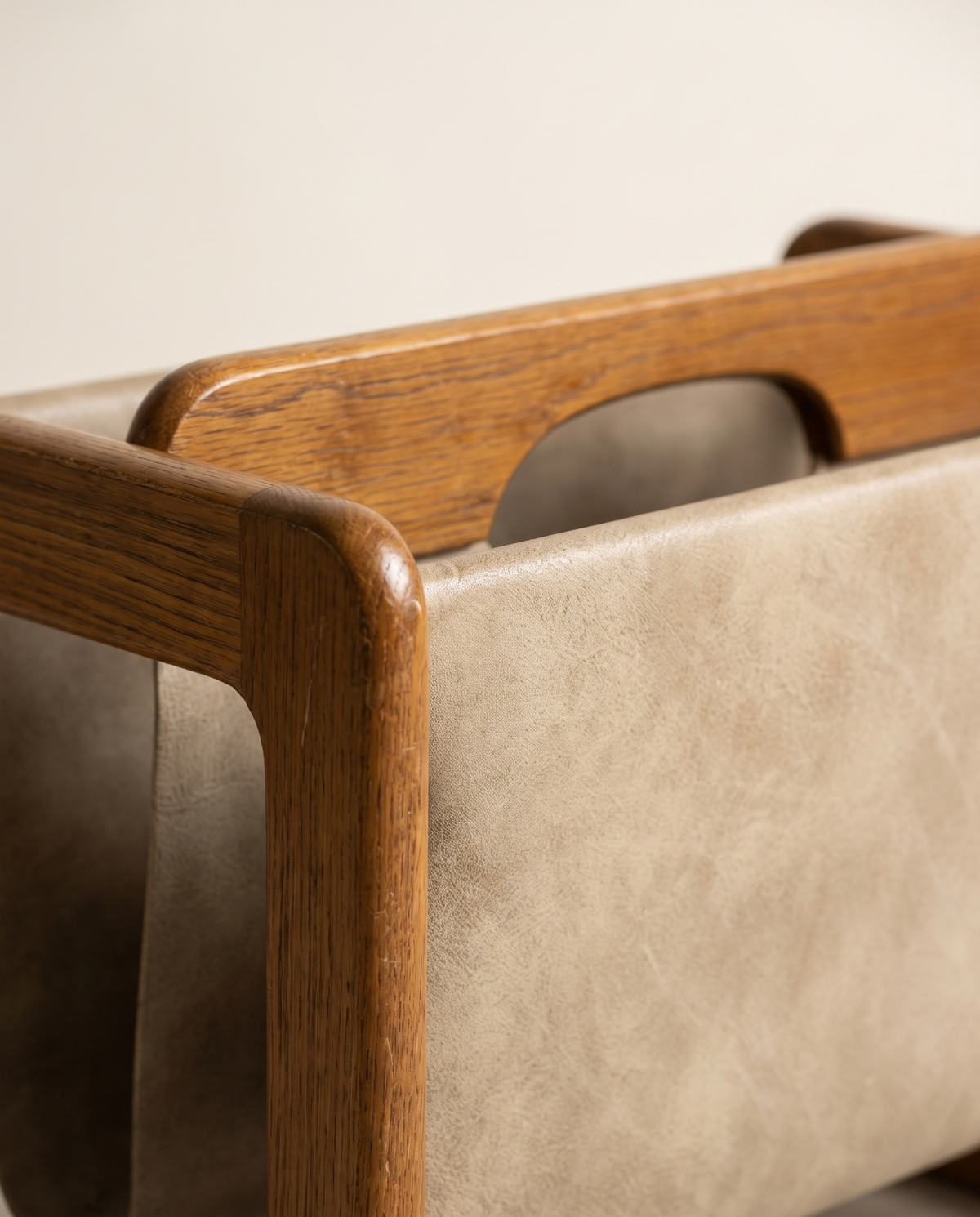 Danish magazine rack in solid oak and leather