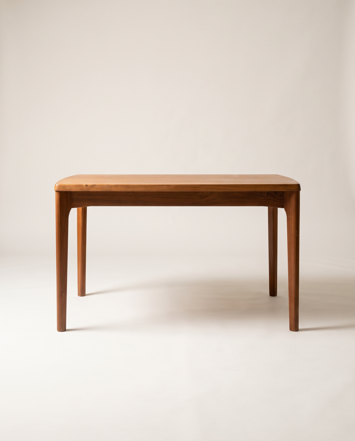 Teak dining table with folded leaves
