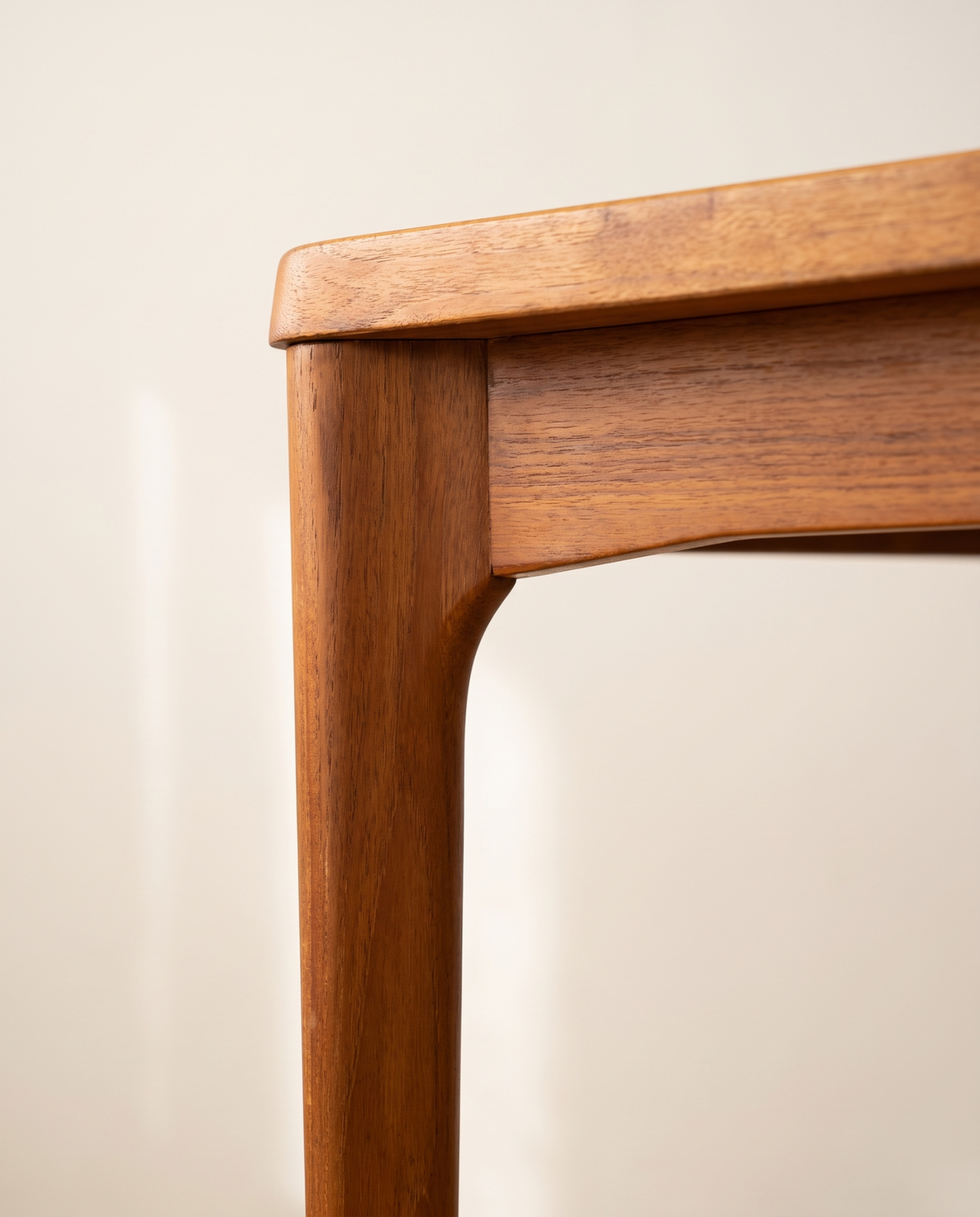 Danish teak extending dining table in interior setting